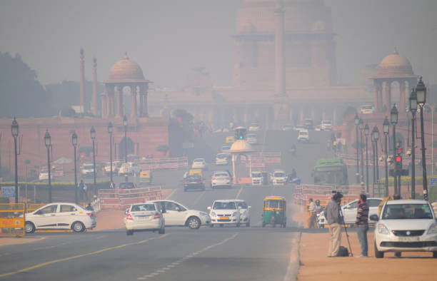 Jawaharlal Nehru Stadium in Delhi under a hazy sky, indicating poor air quality with AQI recorded at 315